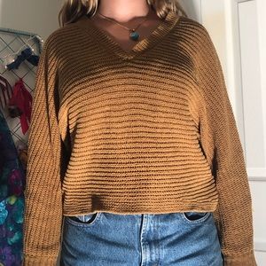 orange sweater v neck